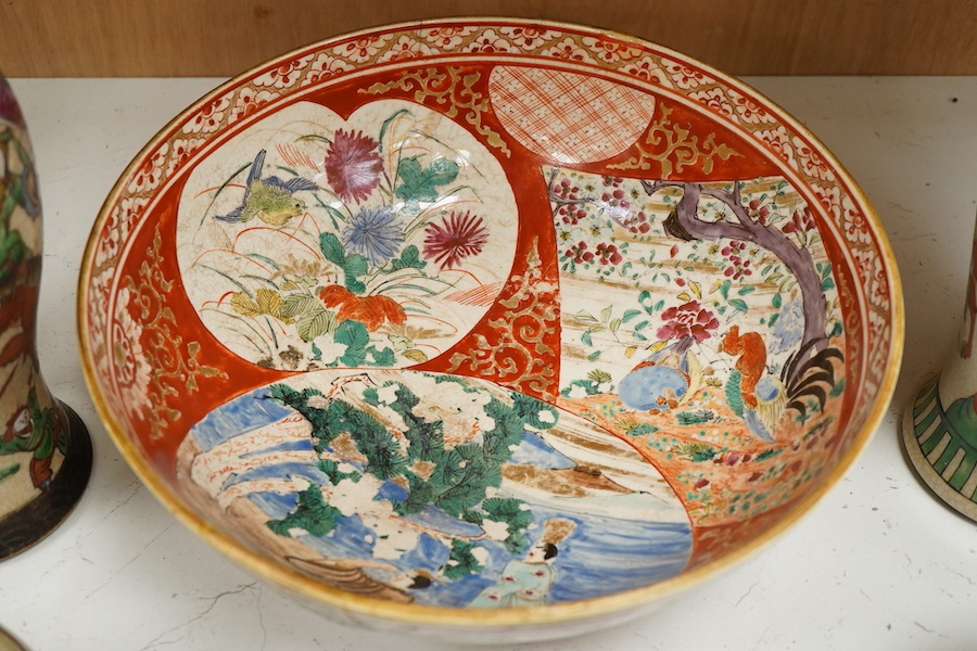 A pair Chinese crackle glaze vases and covers, four jars one with cover and a Japanese Kutani bowl, bowl 30cm diameter